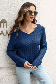 Dark blue acrylic cable knit pullover sweater with cold shoulder and V-neck.