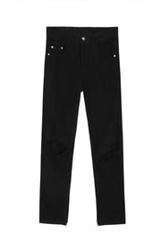 Black skinny fit denim jeans with distressed knees and ankle zippers.