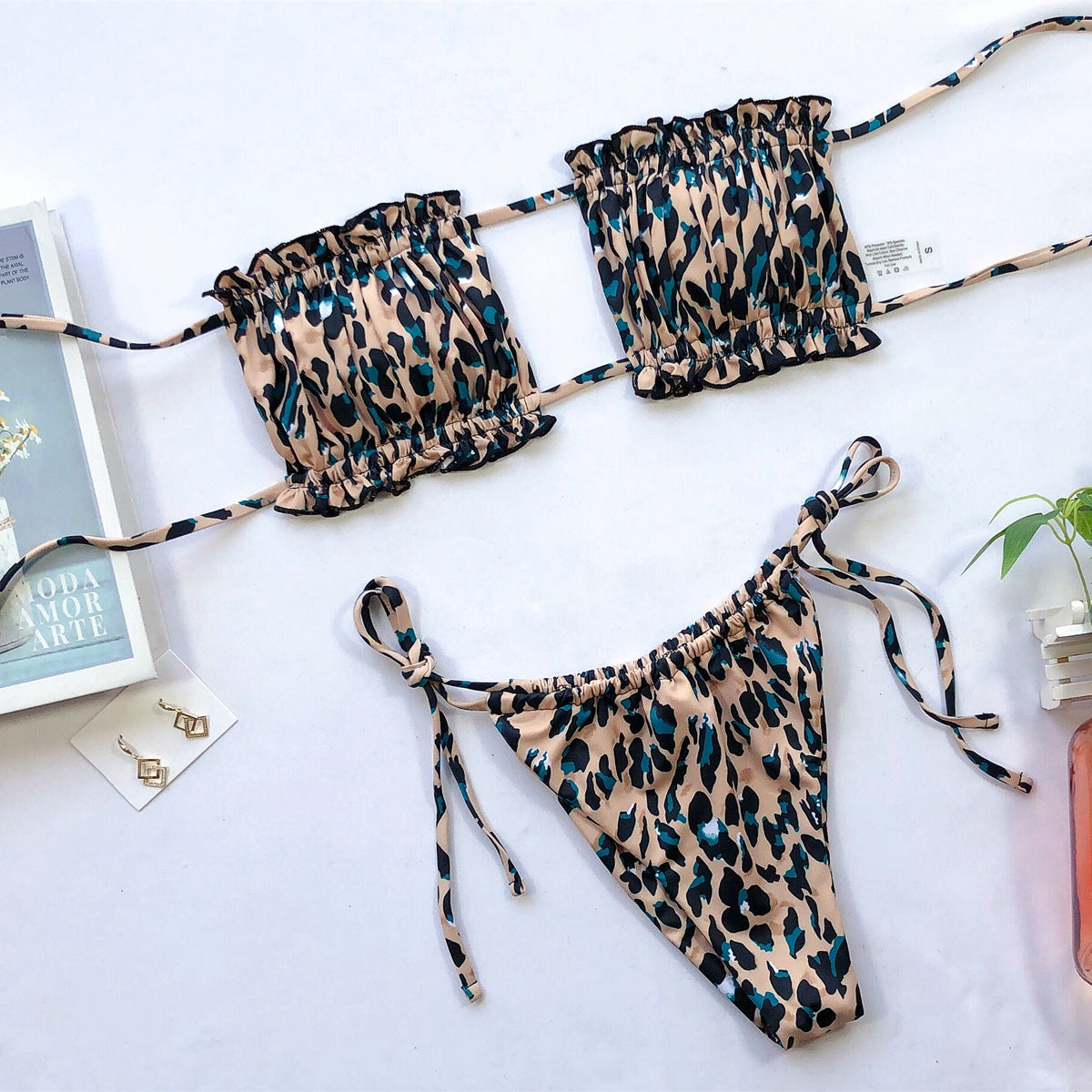 Leopard print bandeau bikini set with ruffled trim and tie sides.
