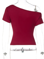 Red fitted one-shoulder t-shirt with short sleeves and button detail.