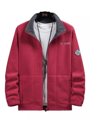 Red fleece zip-up jacket with grey collar and embroidered logo detail.