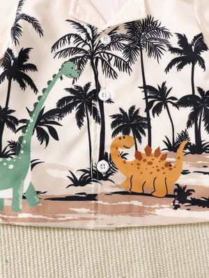 Baby boys' set with dinosaur and palm tree print, featuring a collared shirt with white buttons.