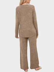 Ribbed knit lounge set in camel, featuring a long sleeve top and wide leg pants.