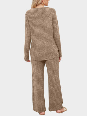 Ribbed knit lounge set in camel, featuring a long sleeve top and wide leg pants.
