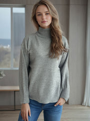 Gray relaxed fit turtleneck sweater with ribbed cuffs and hem.