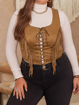 Caramel faux suede vest with fringe and lace-up front detail.