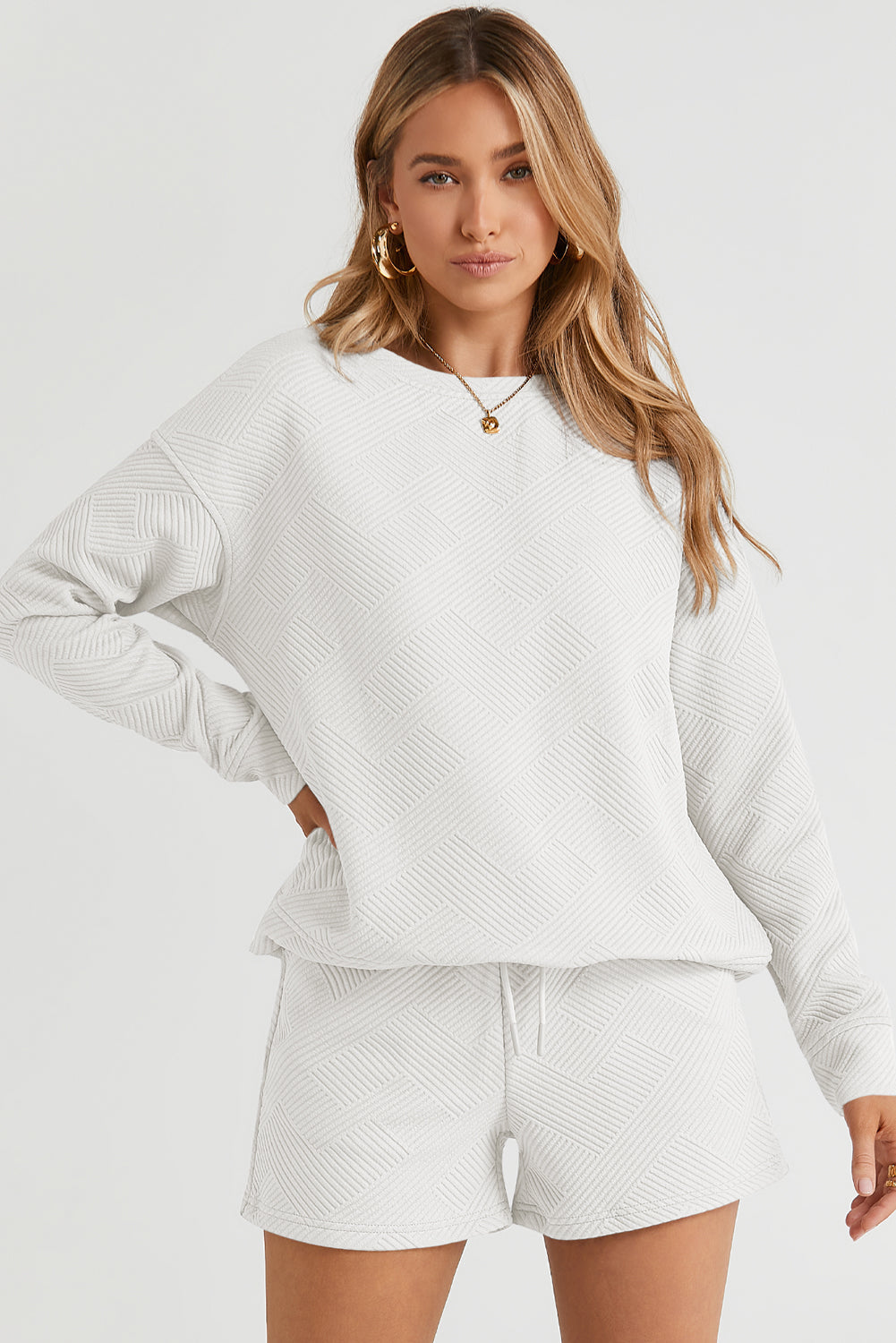 Textured geometric lounge set in white, black, or dark green.