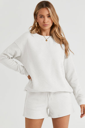 Textured geometric lounge set in white, black, or dark green.