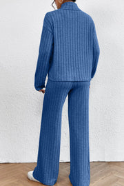 Ribbed knit turtleneck loungewear set in Sky Blue, featuring wide-leg pants and a relaxed fit sweater.