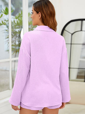 Lavender textured cotton relaxed fit shirt with buttoned collar and long sleeves.