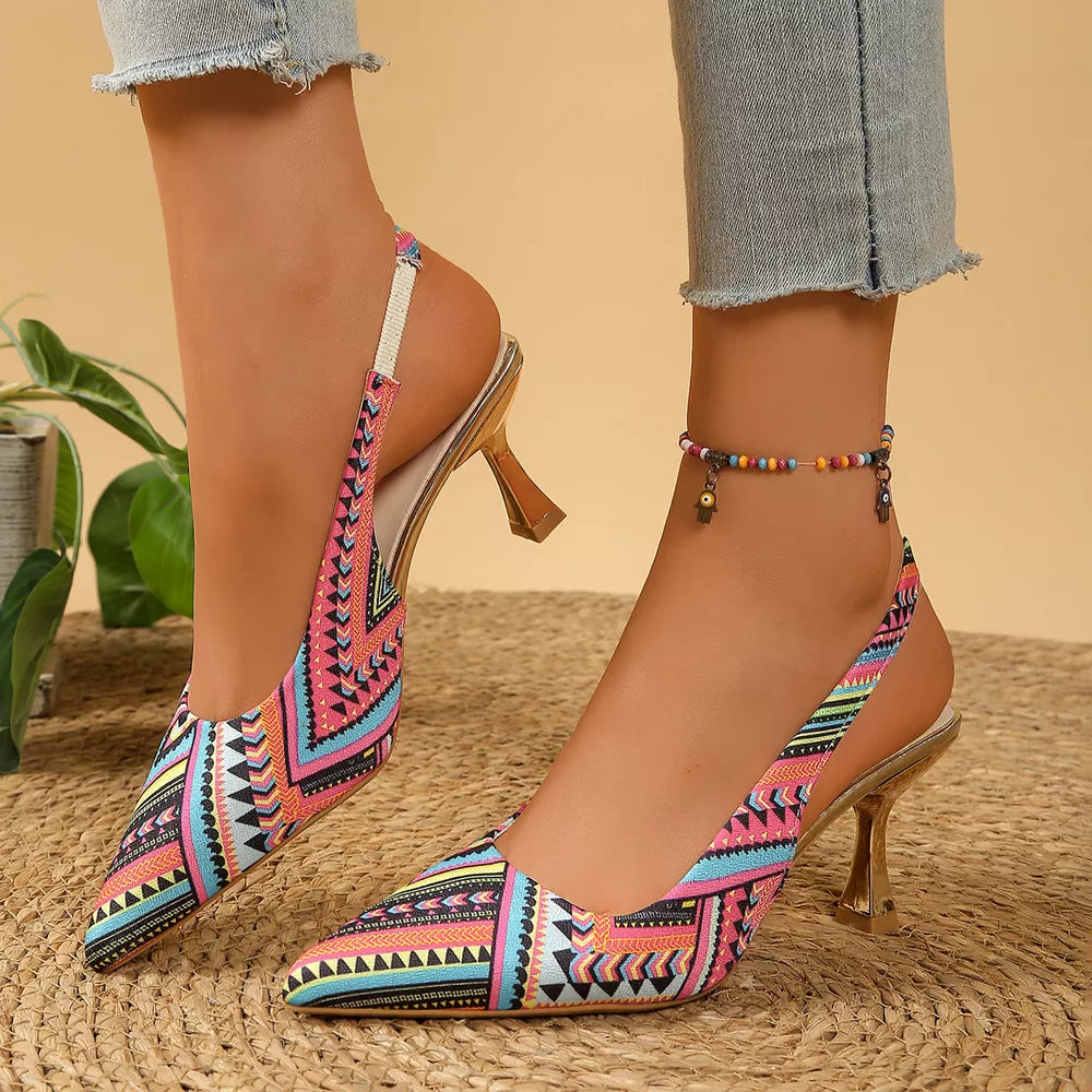 Geometric patterned slingback kitten heels in multicolor with pointed toe and gold heel.