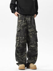 Relaxed fit dark camo cargo pants with multiple pockets.