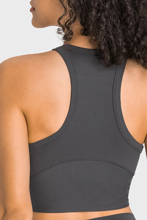 Gray racerback crop top with sculpted neckline detail and stitched accents