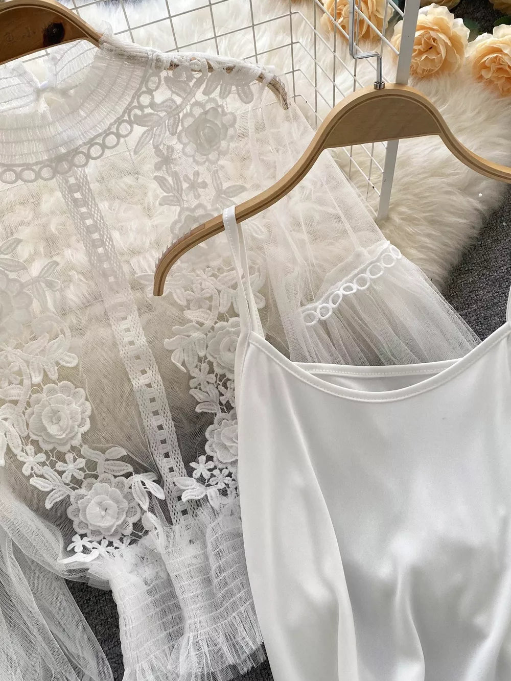 White lace embroidered blouse and cami set with floral details and sheer sleeves.