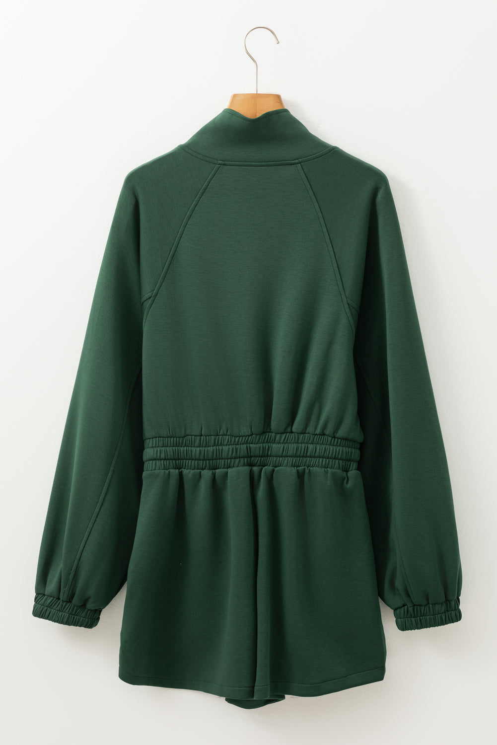 Dark green drawstring waist romper with funnel neck and elasticated cuffs.