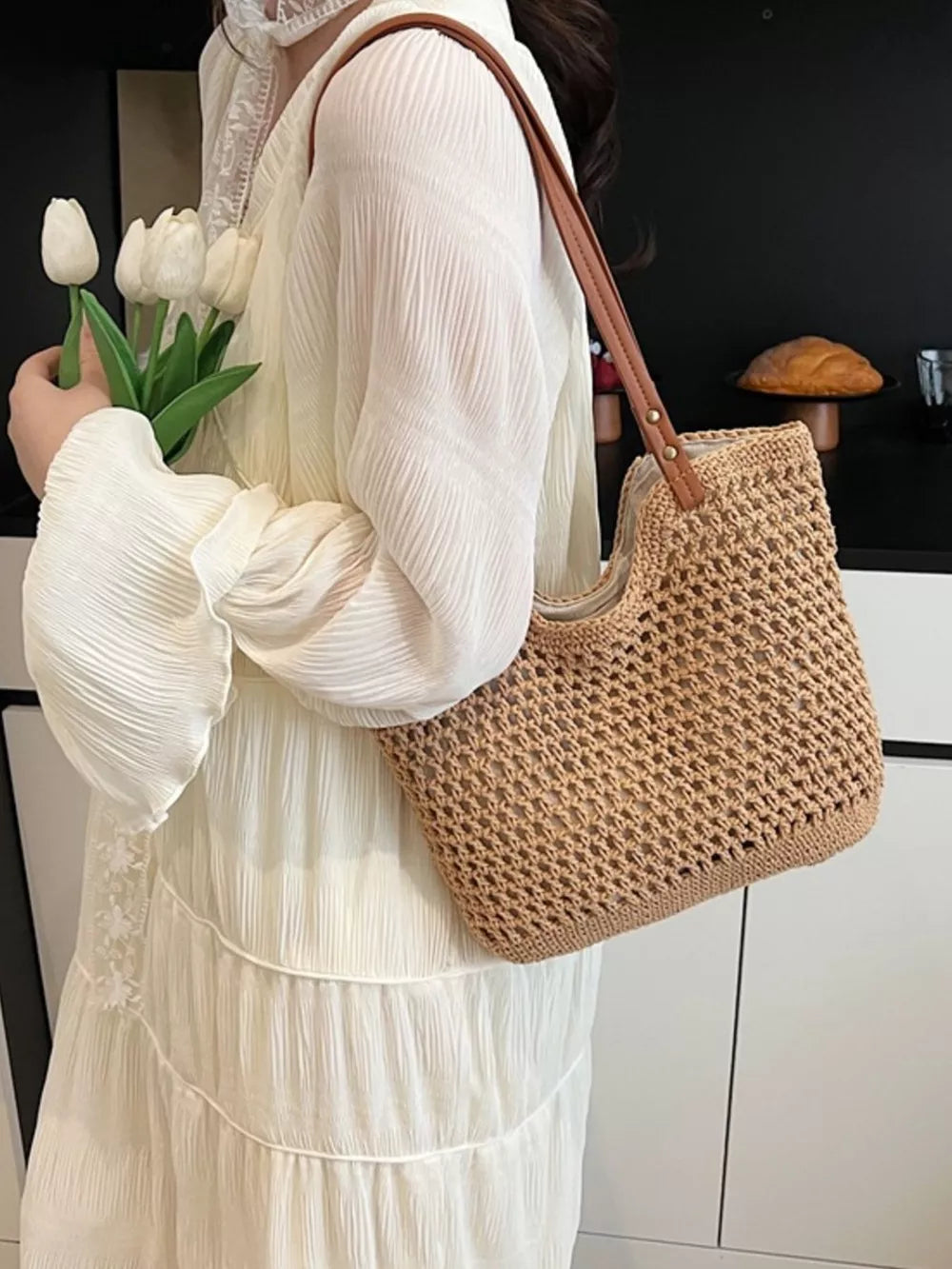 Camel woven straw shoulder bag with leather strap detail