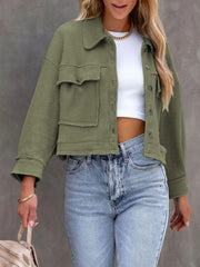 Moss waffle knit cropped utility jacket with buttoned chest pockets and collar.