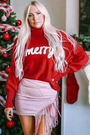 Red acrylic turtleneck sweater with white "merry" graphic and dolman sleeves.