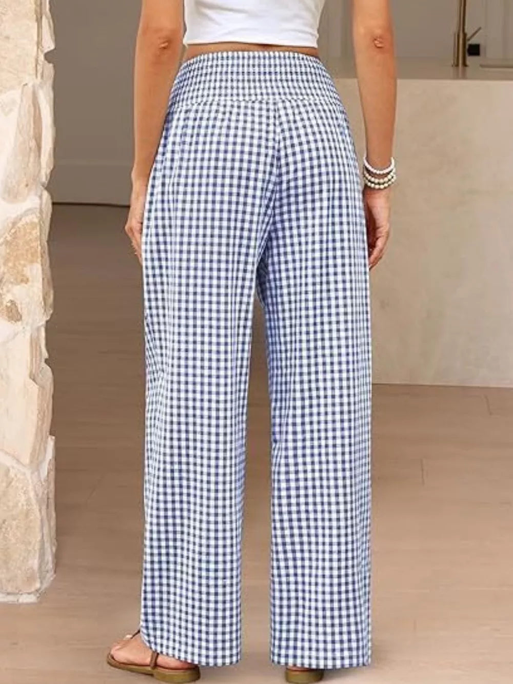 Blue plaid maternity pants with smocked waistband and wide legs.