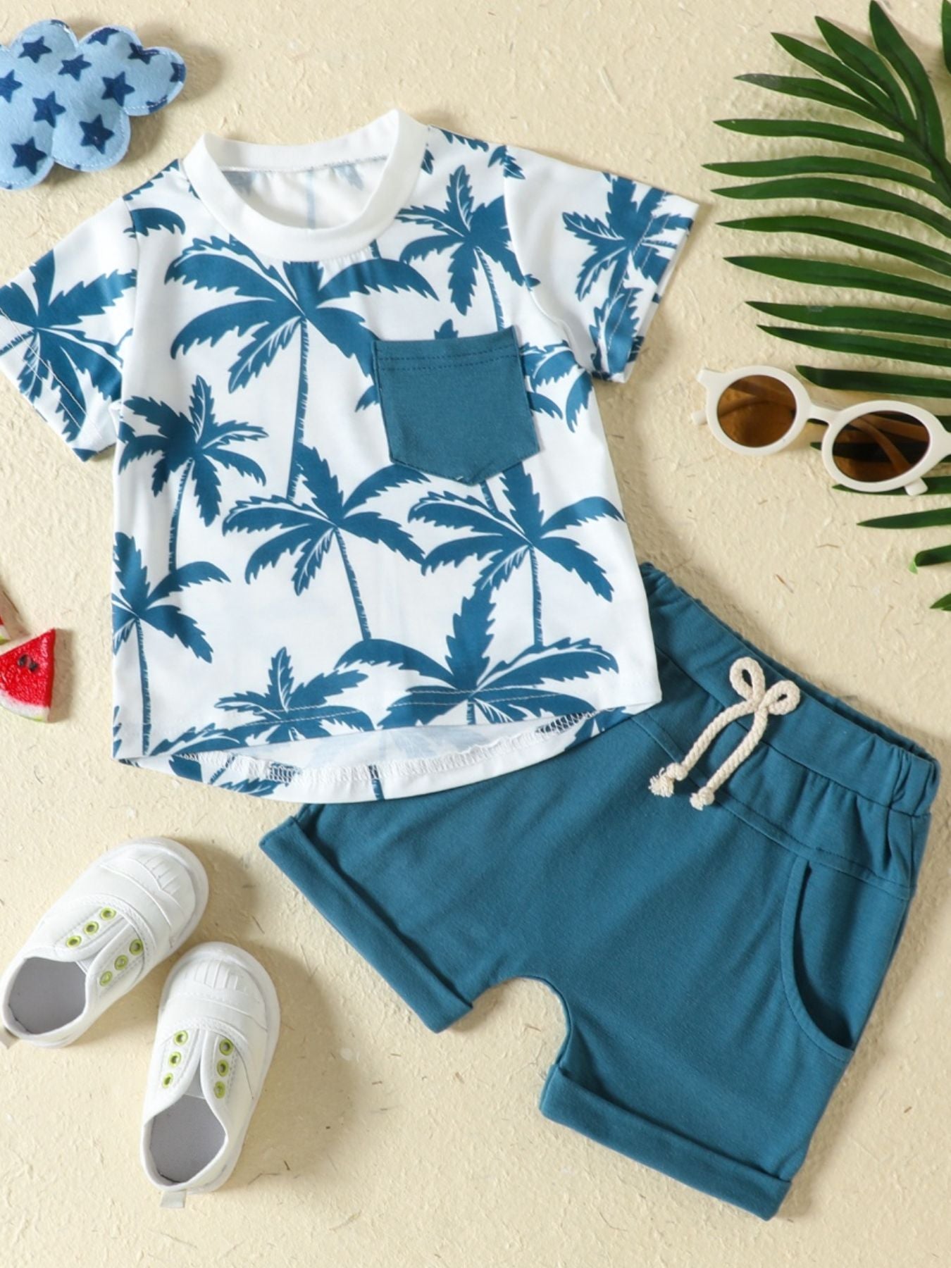 Baby set in French Blue with palm tree print t-shirt and shorts.
