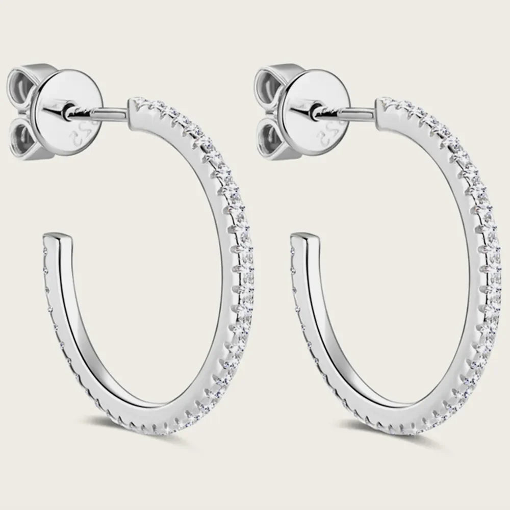 Silver pavé-set C-hoop earrings with clear stones