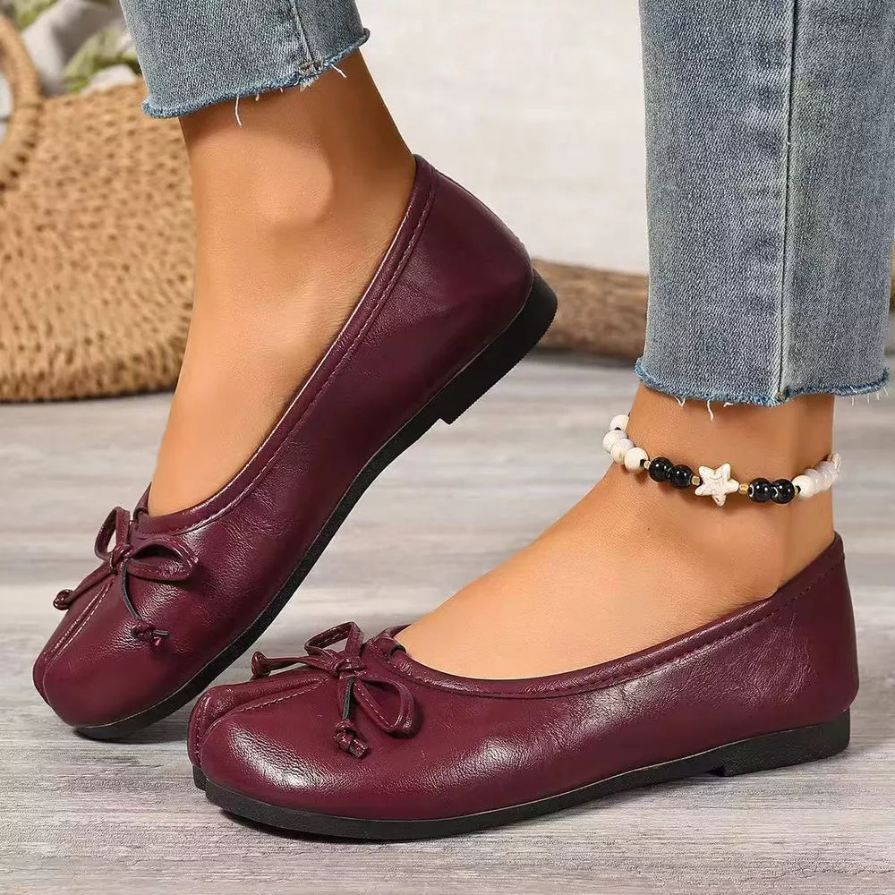 Burgundy bow-embellished tabi slip-on flats with square toe detail.