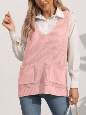 Oversized dusty pink knit vest with V-neck and two patch pockets.