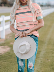 Striped crew neck t-shirt in dusty pink with grey and mint green stripes, short sleeves.
