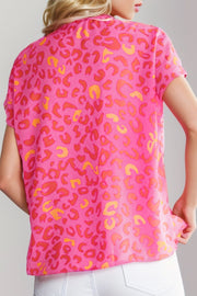 Hot pink leopard print blouse with flutter sleeves and v-neck.