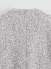 Textured knit tie-front coat in silver gray, showing back seam detail.