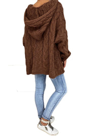 Brown cable knit hooded cocoon sweater with a relaxed fit.