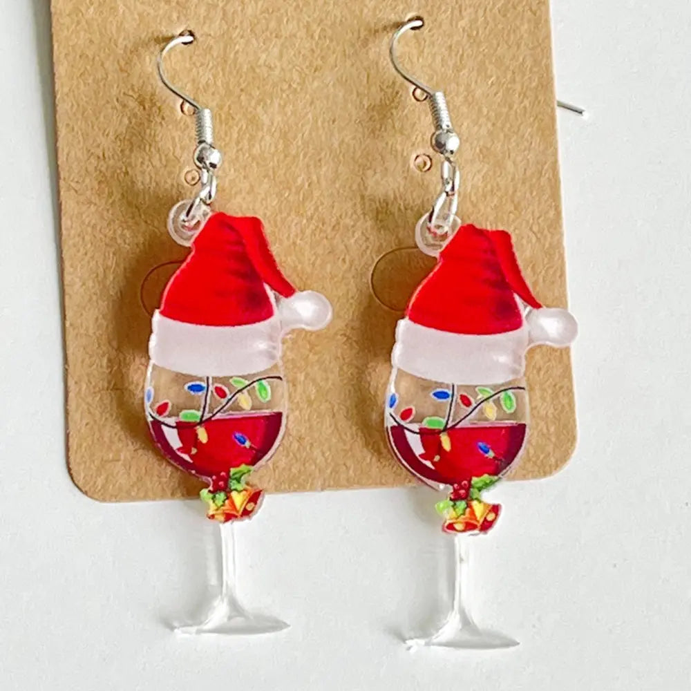 Festive acrylic wine glass drop earrings with Santa hats and Christmas lights