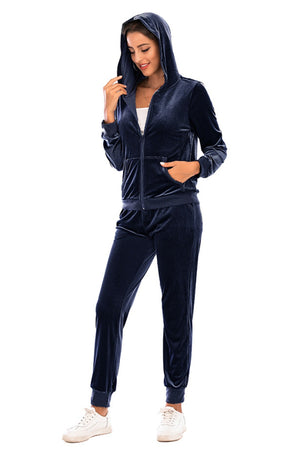 Velvet loungewear set in Peacock Blue, zip-up hoodie with pockets and matching joggers.