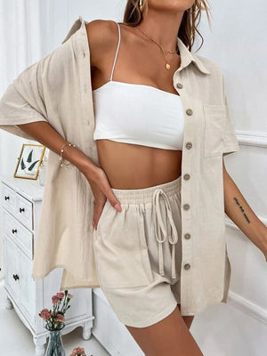 Linen co-ord set with buttoned shirt and drawstring shorts in tan.