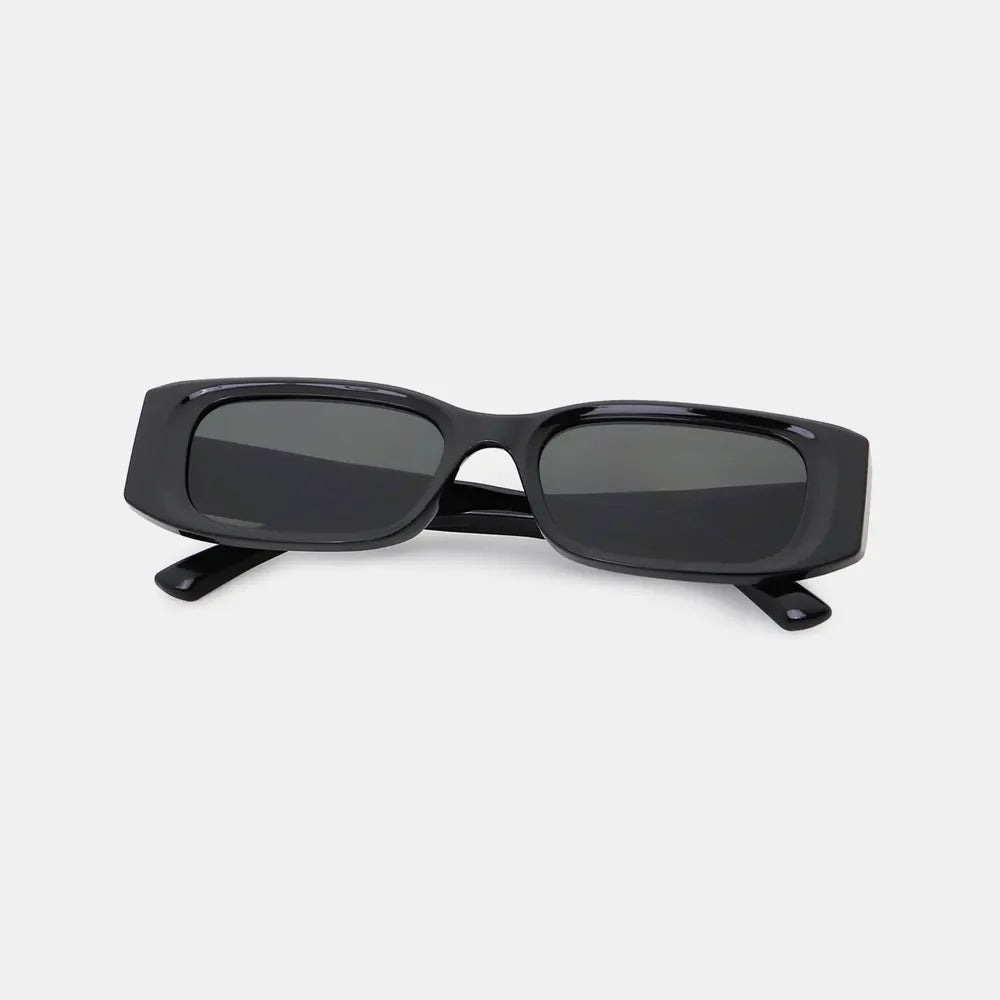 Black chunky rectangular sunglasses with dark lenses and thick frames.