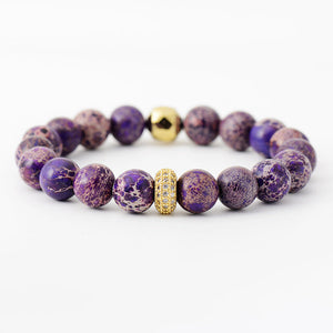 Purple jasper bead bracelet with gold accents and crystal detail