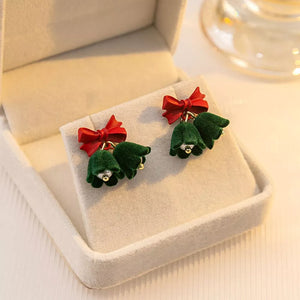Velvet bell earrings in dark green with red bows and gold accents.