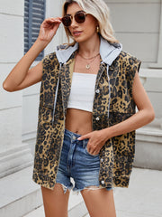 Leopard print denim utility vest with a removable grey hood and button front.