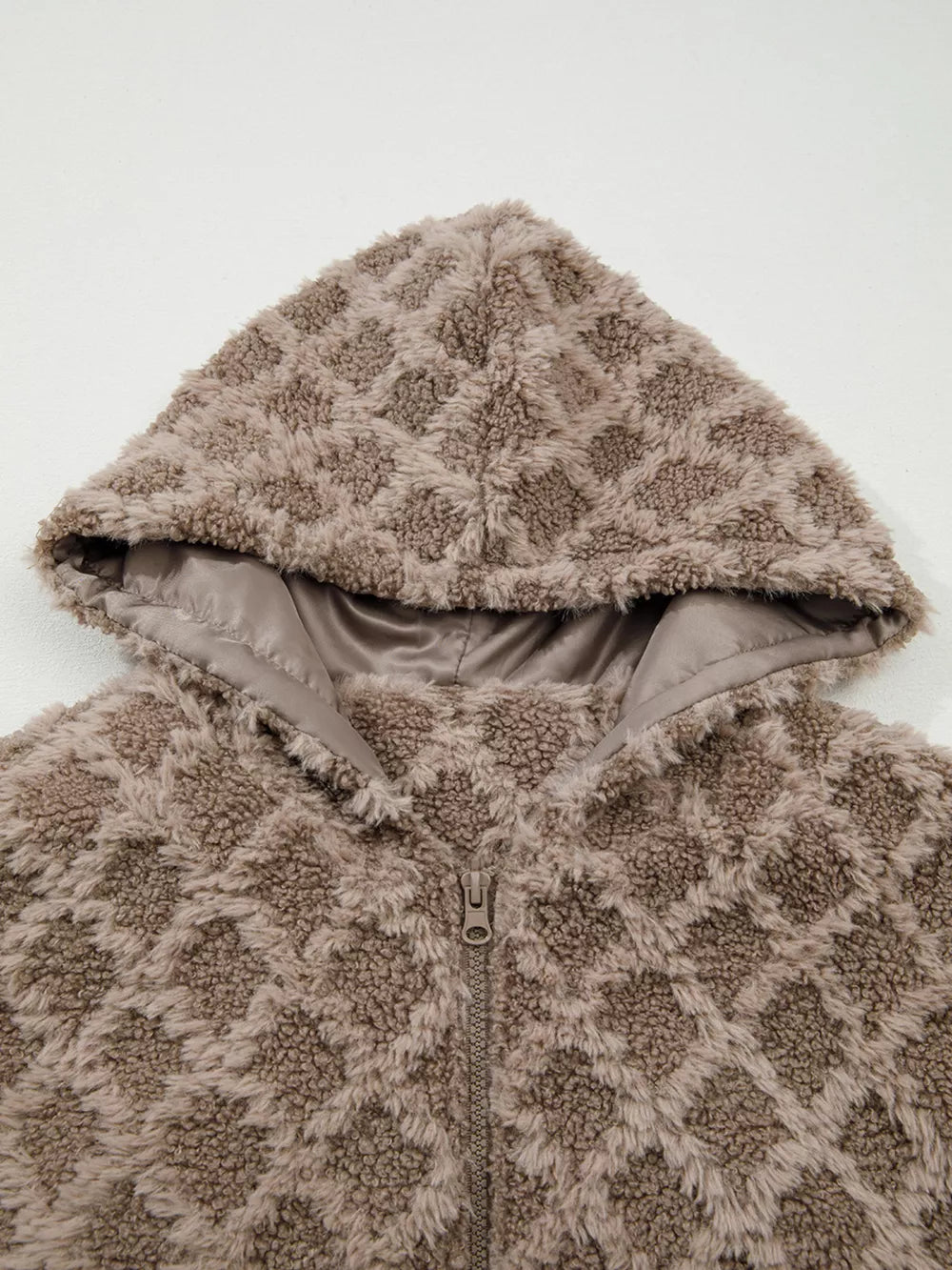 Textured sherpa fleece hooded jacket in taupe with a diamond pattern and zip front.