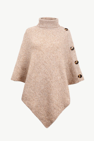 Tan knit poncho with turtleneck and button details on the side.