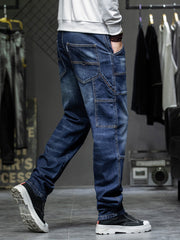 Men's dark blue 100% cotton cargo jeans with relaxed fit and multiple pockets.