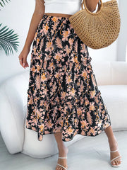 Black floral midi skirt with ruffle hem and tiered design.