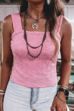 Pink textured fitted square neck tank top with a subtle floral pattern.