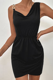 Black mini dress with asymmetric neckline, gold shoulder detail, and ruched skirt.