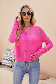 Hot Pink raglan sleeve button-up knit cardigan with V-neck and wooden buttons.