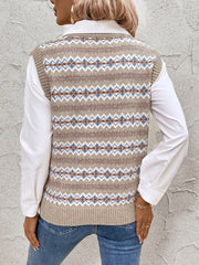 Geometric knit V-neck vest in mocha with a fair isle pattern, styled over a white shirt.