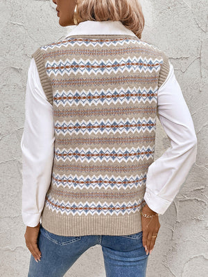 Geometric knit V-neck vest in mocha with a fair isle pattern, styled over a white shirt.