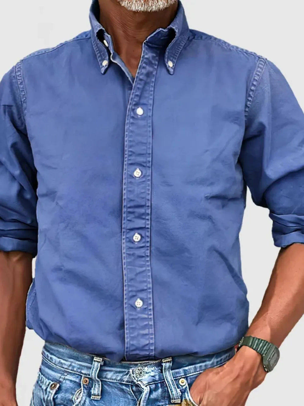 Blue Oxford button-down shirt with relaxed fit and button collar.