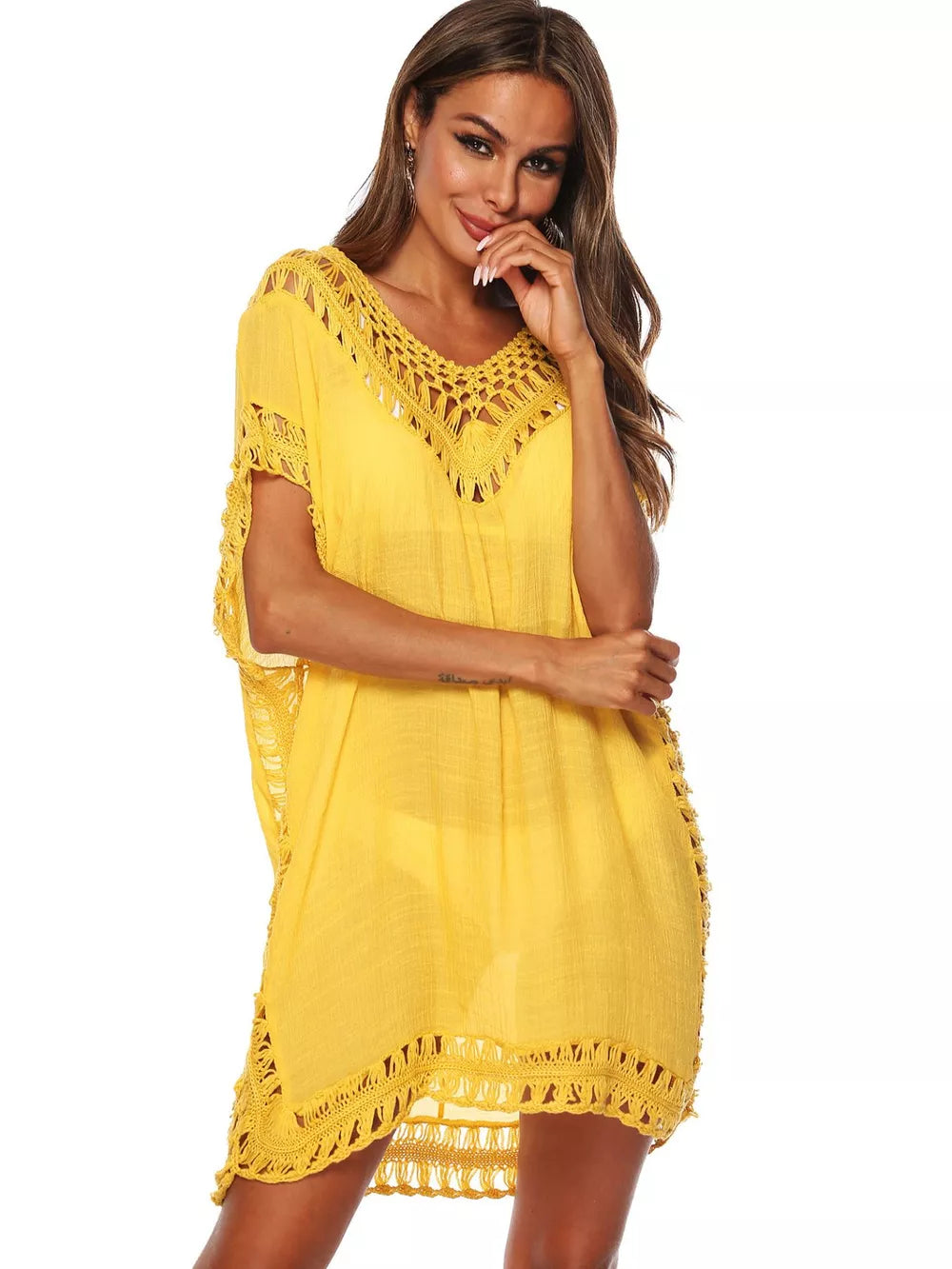 Yellow crochet V-neck cover-up dress with fringe hem and cutout details.