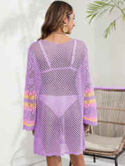 Purple crochet cover-up with striped sleeves and open knit detail.